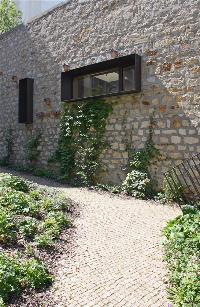 percement de baie dans le mur mitoyen du foyer Mélingue

